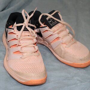 Women's Nike Zoom light orange/black tennis shoes. Size 7.